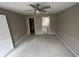 Primary bedroom with ensuite bathroom and walk-in closet at 7533 Merchantville Cir, Zephyrhills, FL 33540