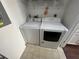 Bright laundry room with modern washer and dryer at 7724 St Andrews Blvd, Weeki Wachee, FL 34613