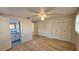 Main bedroom with an ensuite bathroom and ample closet space at 7930 Valmy Ln, Port Richey, FL 34668