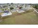 Aerial view of house, highlighting its location in a residential area at 7943 Merchantville Cir, Zephyrhills, FL 33540