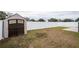 Backyard with shed and privacy fence at 7943 Merchantville Cir, Zephyrhills, FL 33540