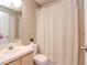 Clean bathroom with shower/tub combo and updated vanity at 8811 Casablanca Way # 106, Tampa, FL 33626