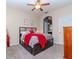 Main bedroom with king-size bed and ceiling fan at 8811 Casablanca Way # 106, Tampa, FL 33626