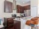 Stylish kitchen with granite countertops, stainless steel appliances, and island at 8811 Casablanca Way # 106, Tampa, FL 33626