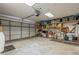 Attached garage with shelving for extra storage at 9070 Bryan Dairy Rd, Seminole, FL 33777