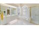 Elegant bathroom with double vanity and large shower at 9144 Highland Ridge Way, Tampa, FL 33647