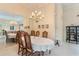 Formal dining room featuring a large table and mirror at 9144 Highland Ridge Way, Tampa, FL 33647