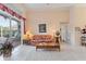 Living room with sliding doors leading to a pool view at 9144 Highland Ridge Way, Tampa, FL 33647