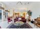 Bright living room with a view of the kitchen and pool at 9144 Highland Ridge Way, Tampa, FL 33647