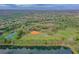 Aerial view of community park with fields and courts at 9144 Highland Ridge Way, Tampa, FL 33647