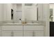 Double vanity bathroom with granite countertops at 9189 Bonita Mar Dr, Parrish, FL 34219