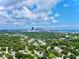 Aerial view of a residential area with a cityscape in the background at 963 27Th S Ave, St Petersburg, FL 33705