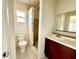 Bathroom with shower and dark vanity at 963 27Th S Ave, St Petersburg, FL 33705