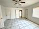 Bedroom with tile floors and ceiling fan at 963 27Th S Ave, St Petersburg, FL 33705