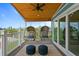 Tranquil balcony with hanging chairs, perfect for relaxation at 2203 Avenue B, Bradenton Beach, FL 34217