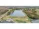 Aerial view of golf course and lake at 10525 Lucaya Dr, Tampa, FL 33647