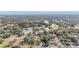 Wide aerial view showing the neighborhood and golf course at 11012 N Oregon Ave, Tampa, FL 33612