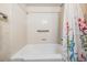 Clean bathroom with shower/tub combo and grab bars at 11012 N Oregon Ave, Tampa, FL 33612