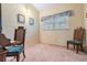 Charming bedroom with two chairs and a window seat at 11012 N Oregon Ave, Tampa, FL 33612