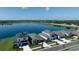 Aerial view of lakefront homes in a new community at 11853 Mile Marsh Dr, Riverview, FL 33569