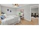 Bedroom with a comfortable bed and view into living area at 1300 S Hercules Ave # 12, Clearwater, FL 33764