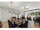 Charming dining area with a dark wood table and black velvet chairs at 1300 S Hercules Ave # 12, Clearwater, FL 33764