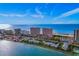 Aerial view of oceanfront community with resort amenities at 1310 Gulf Blvd # 4-G, Clearwater, FL 33767