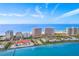 Aerial view of oceanfront community with resort amenities at 1310 Gulf Blvd # 4-G, Clearwater, FL 33767