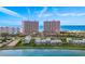 Aerial view of luxurious beachfront twin towers and adjacent buildings at 1310 Gulf Blvd # 4-G, Clearwater, FL 33767