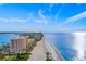 Aerial photograph of beachfront highrise and coastline at 1310 Gulf Blvd # 4-G, Clearwater, FL 33767