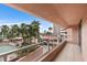 Private balcony overlooking lush tropical landscaping at 1310 Gulf Blvd # 4-G, Clearwater, FL 33767