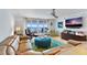 Spacious living room boasts ocean view and comfy seating at 1310 Gulf Blvd # 4-G, Clearwater, FL 33767