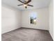 Bright bedroom with neutral decor and a ceiling fan at 1360 Franklin Ln, North Port, FL 34286