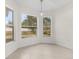 Breakfast nook with large windows and tile flooring at 1360 Franklin Ln, North Port, FL 34286