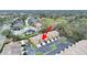 Aerial view of townhome community, highlighting a specific unit's location and surrounding landscape at 13804 Mill Cove Cir, Tampa, FL 33618