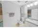 Clean bathroom with shower, toilet and vanity at 13804 Mill Cove Cir, Tampa, FL 33618