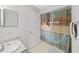 Bright bathroom with shower/tub combo and vanity at 13804 Mill Cove Cir, Tampa, FL 33618