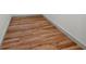 Wood-look tile flooring installed in a hallway or closet at 1400 Farragut Dr, St Petersburg, FL 33710