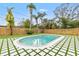 Beautiful oval pool surrounded by a tiled patio at 1400 Farragut Dr, St Petersburg, FL 33710