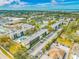 Aerial view of community with pool and ocean views at 14130 Rosemary Ln # 2203, Largo, FL 33774