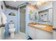 Bright bathroom with shower, toilet and vanity at 14130 Rosemary Ln # 2203, Largo, FL 33774