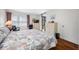 Bedroom with king-size bed and built in dresser at 14130 Rosemary Ln # 2203, Largo, FL 33774