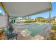 Enjoy Shuffleboard on two courts under covered area at 14130 Rosemary Ln # 2203, Largo, FL 33774