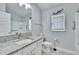 Bathroom boasts granite countertop, shower, and toilet at 14525 Scottburgh Glen Dr, Wimauma, FL 33598