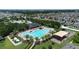 Community pool with sundeck and playground nearby at 14525 Scottburgh Glen Dr, Wimauma, FL 33598