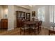 Formal dining room with hardwood floors and built-in hutch at 16809 Woburn Ln, Lutz, FL 33549