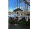 White gazebo overlooking a peaceful lake at 16809 Woburn Ln, Lutz, FL 33549