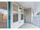 Private balcony with exterior access and additional windows at 1946 Hammocks Ave # 803, Lutz, FL 33549