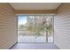 Screened balcony overlooking a tranquil waterway at 1946 Hammocks Ave, Lutz, FL 33549