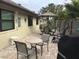 Charming backyard with patio furniture and grill at 2217 Sequoia Dr, Clearwater, FL 33763